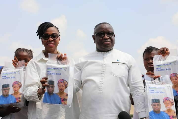 President Bio and wife displaying sanitary pads. Photo Credit-State House Communications.