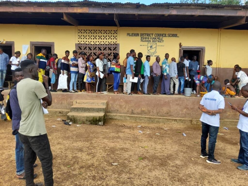 Voters' queue at a polling station in Pujehun. Photo Credit: ECSL on FaceBook.